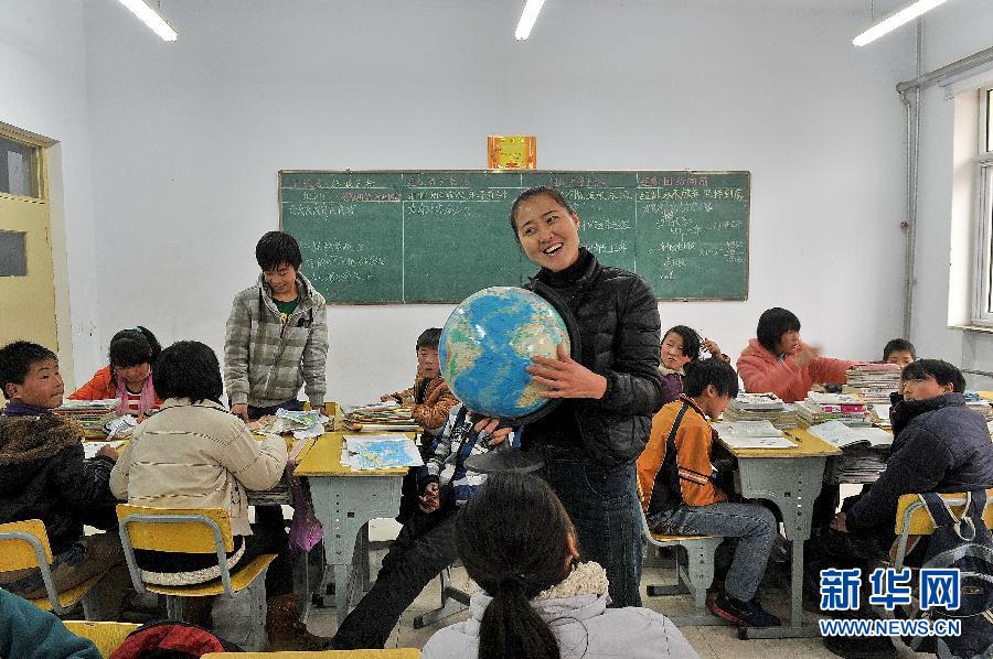 (走基层 听民声)(7)最美丽的老师 最坚强的母亲